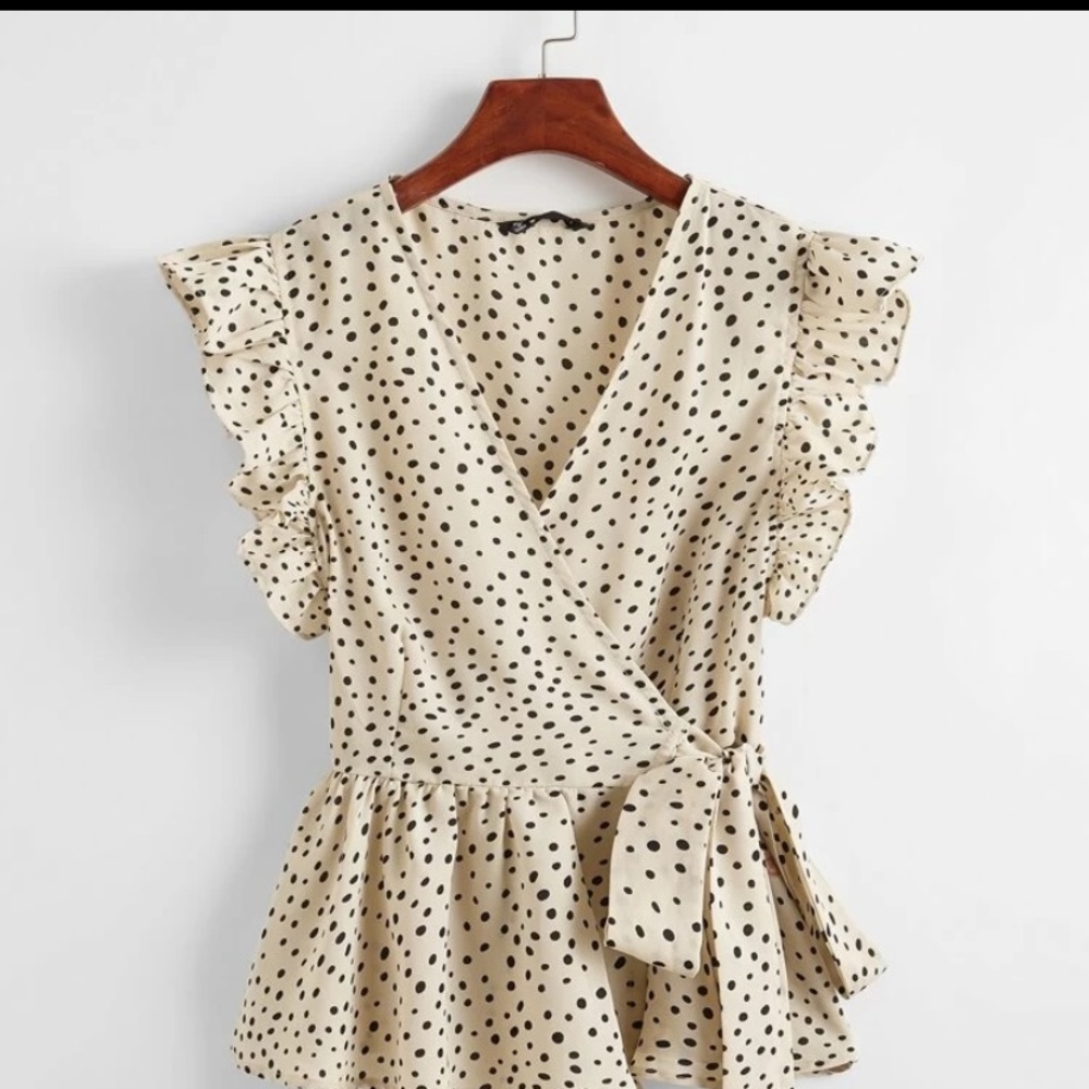 Ruffle peplum wrap top